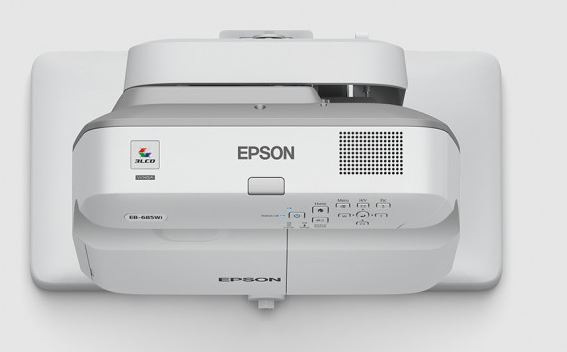 Epson projector with interactive whiteboard capability (ActivPanel 9) displayed on a white wall.
